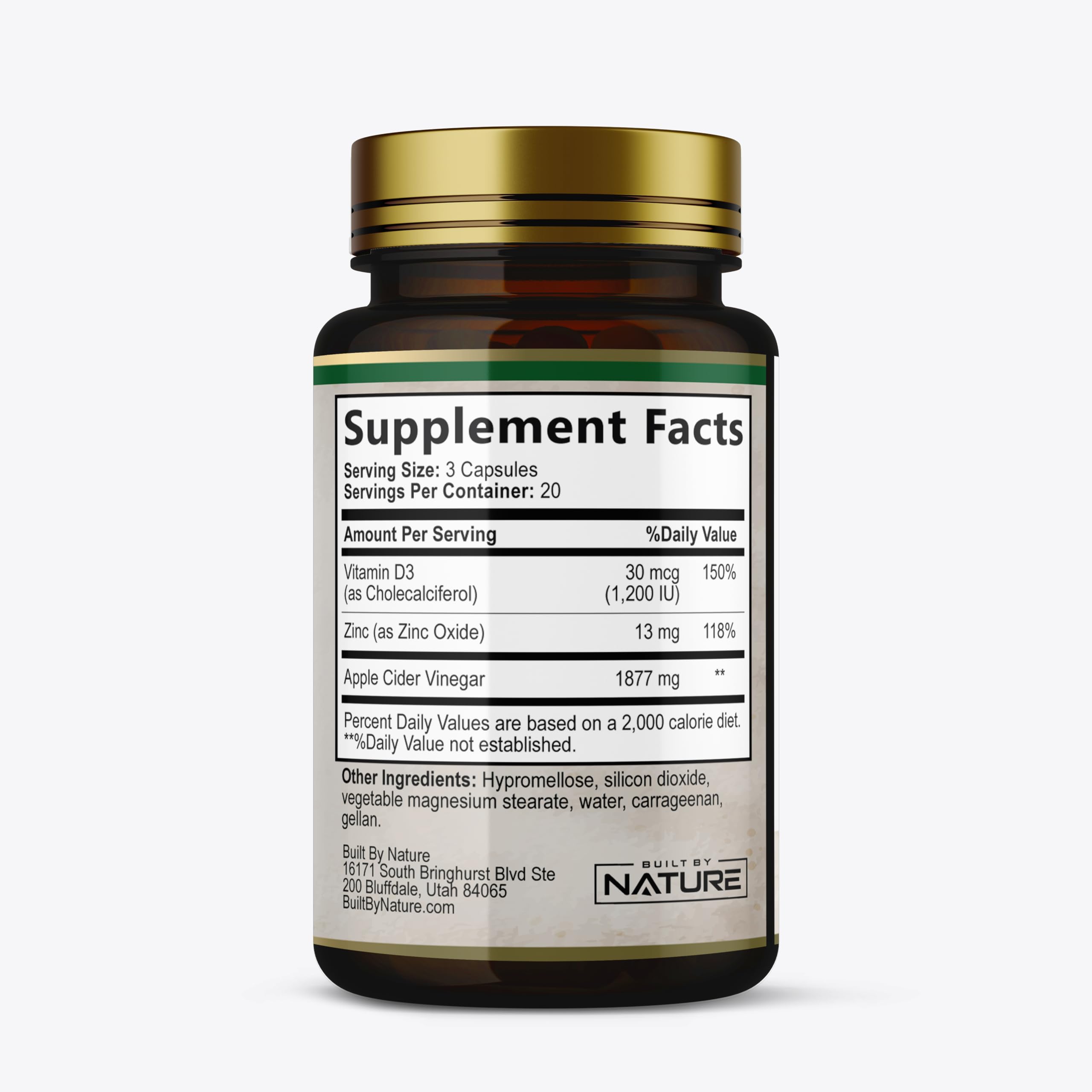 Built by Nature Apple Cider Vinegar capsules with a glass of water for easy daily intake.