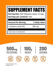 Pouring BulkSupplements L-Glutamic Acid HCl powder into a glass for convenient mixing.