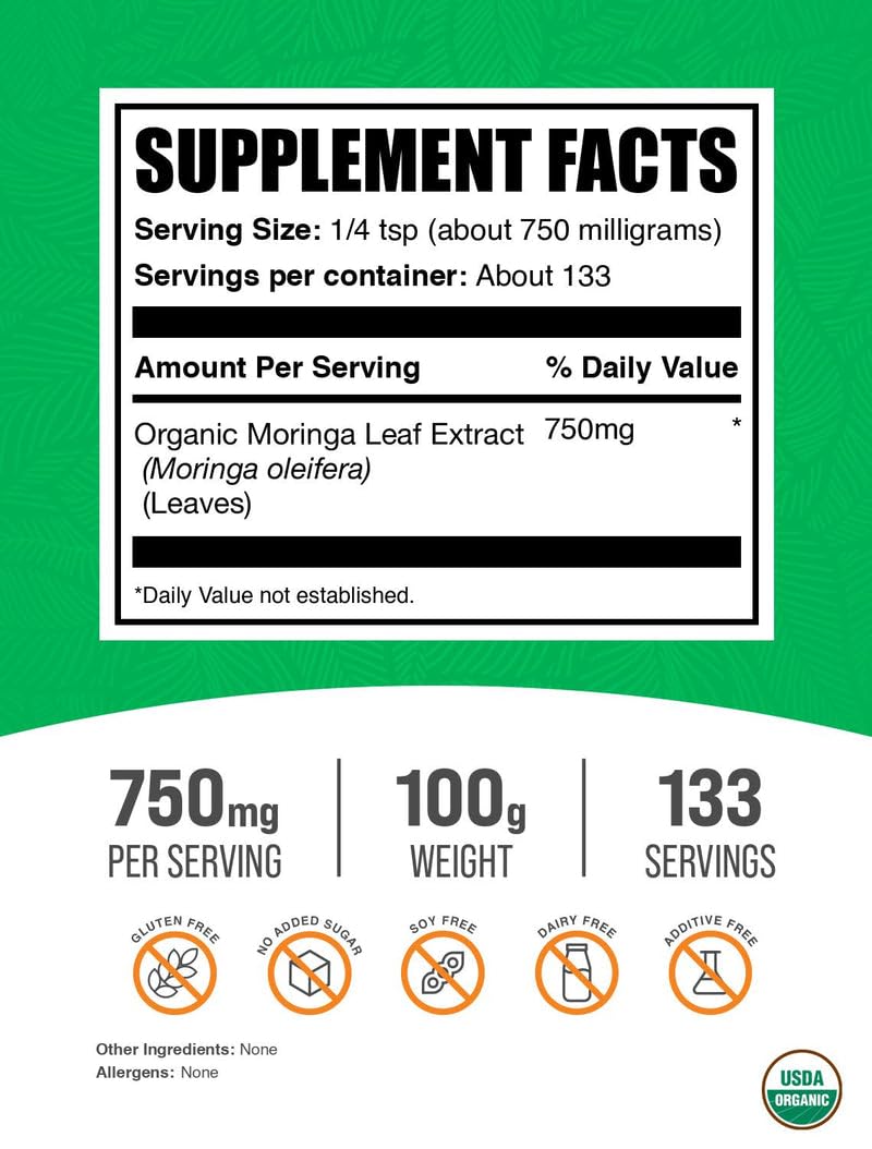 BulkSupplements Moringa powder being poured into a glass for quick mixing.