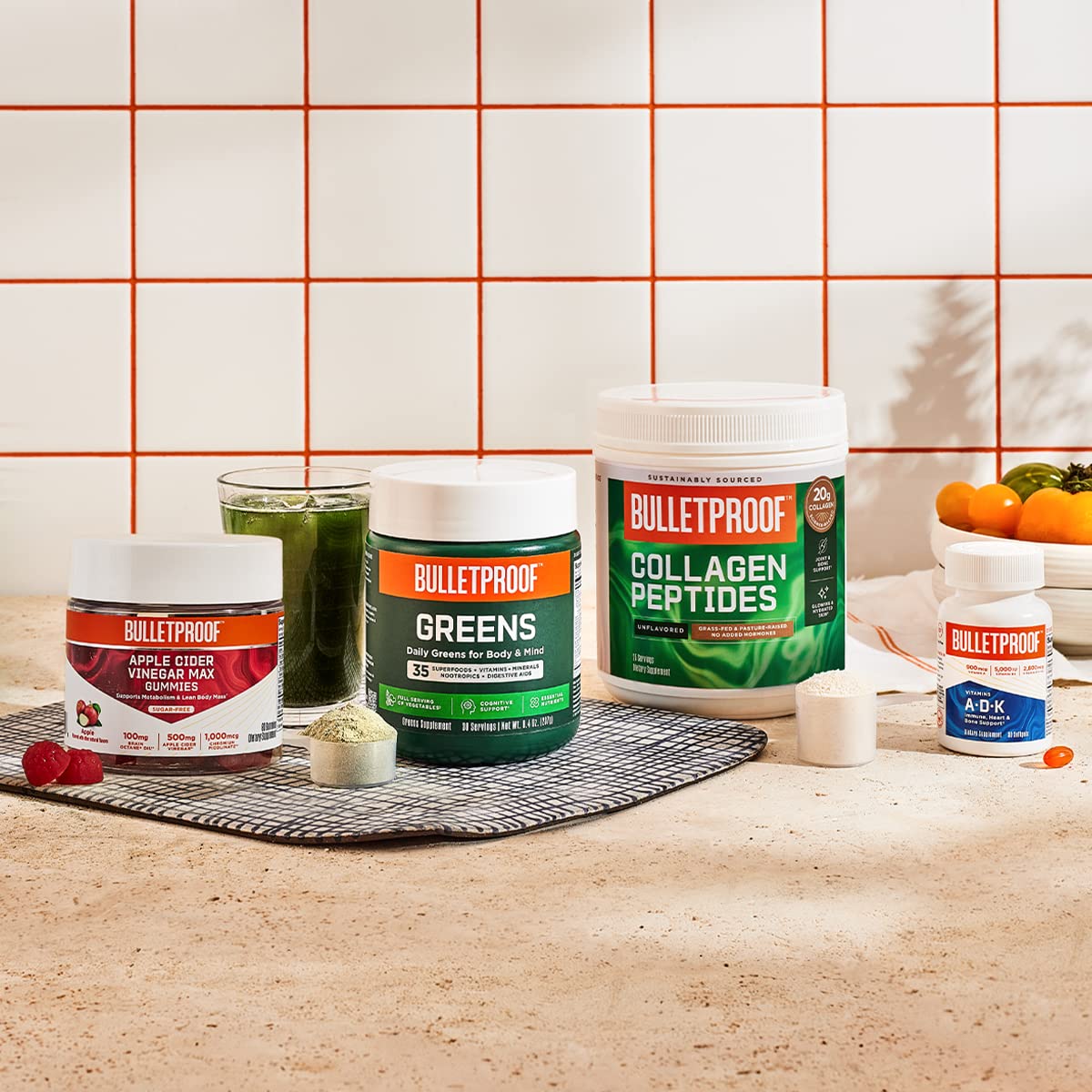Bulletproof Greens daily shake glass demonstrates quick mix with water.