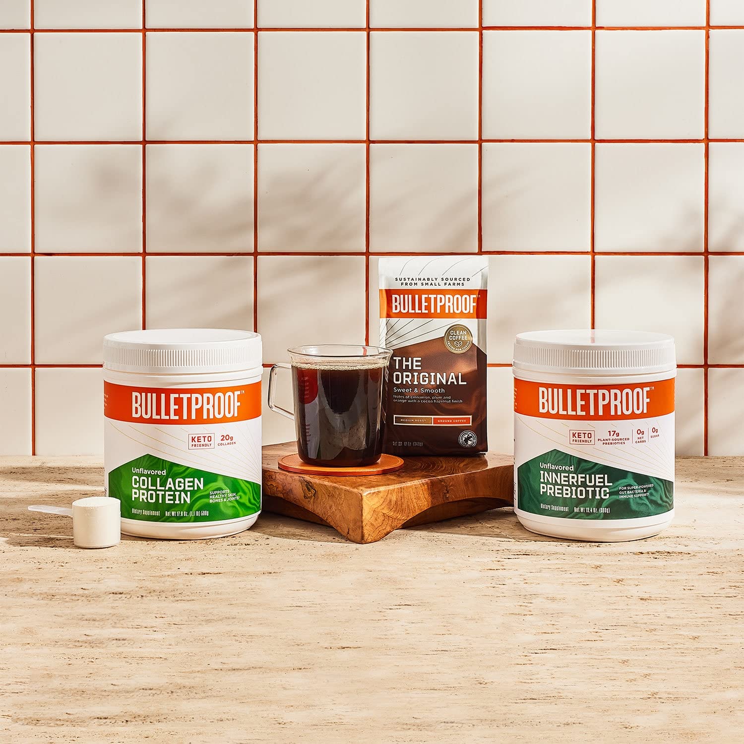 Bulletproof Innerfuel daily-use scoop beside a beverage for easy integration.