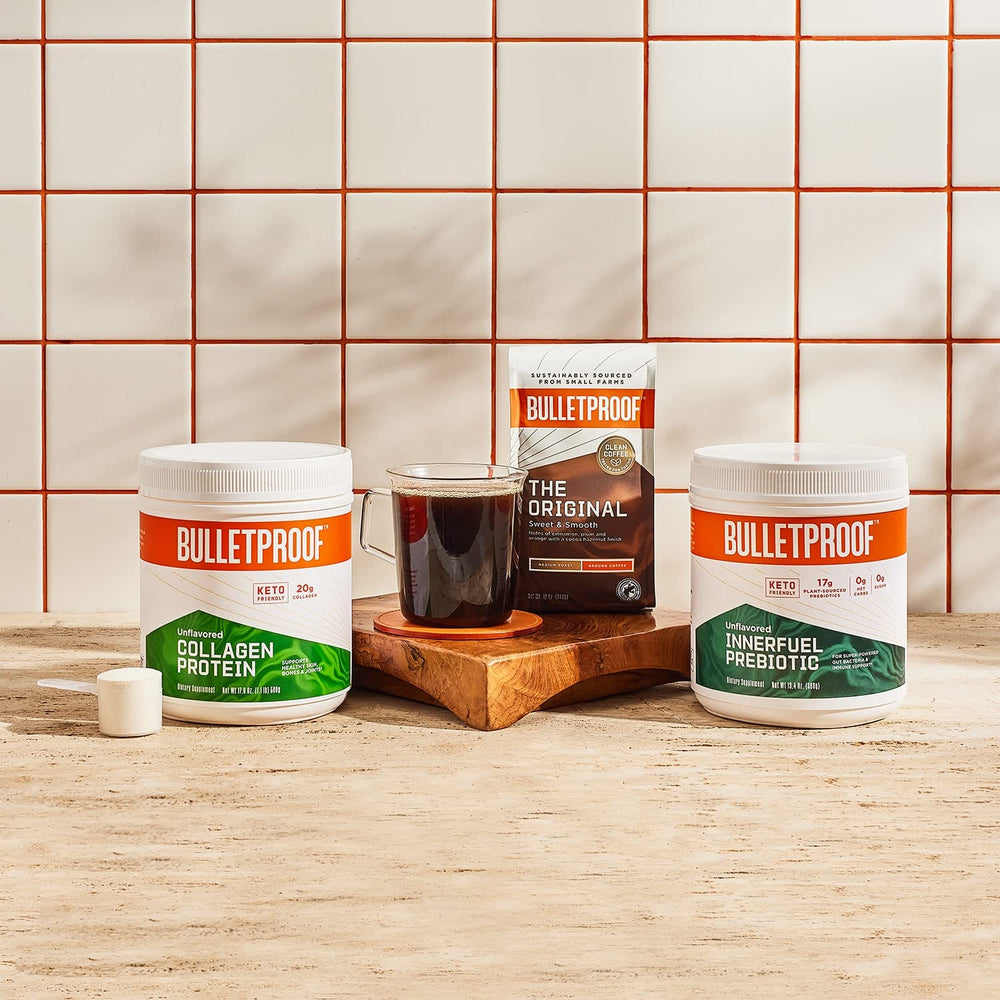 Bulletproof Innerfuel daily-use scoop beside a beverage for easy integration.