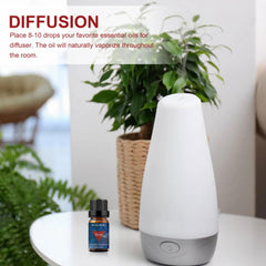 BURIBURI Rose essential oil bottle shown for soap crafting and candles.