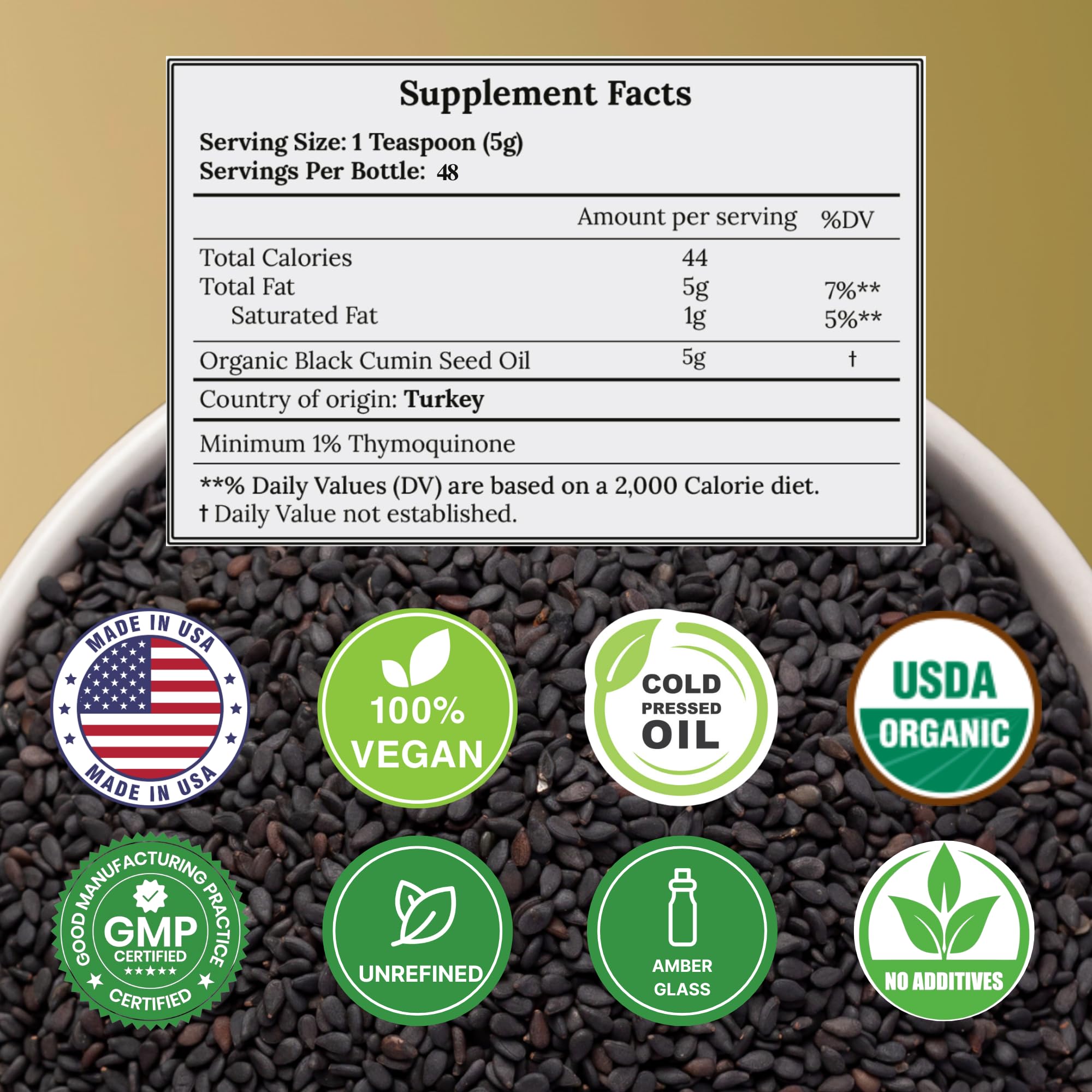 C CARE black seed oil cap close-up showing quality seal and packaging.