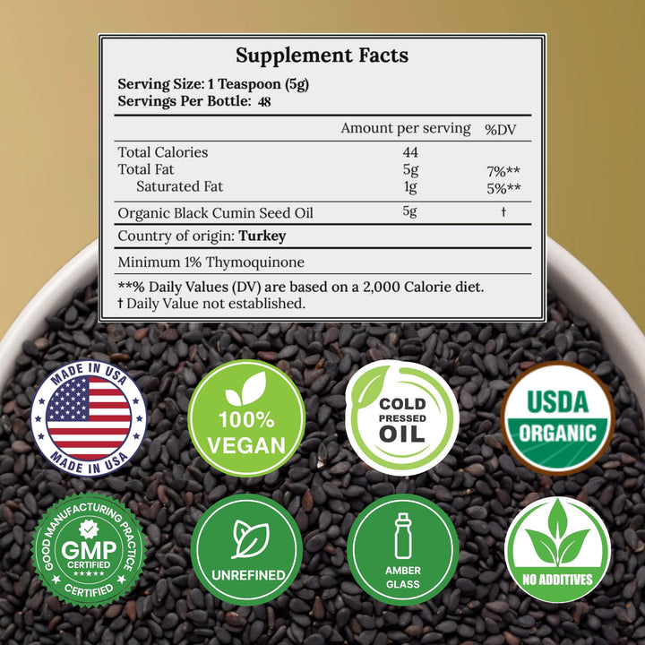 C CARE black seed oil cap close-up showing quality seal and packaging.
