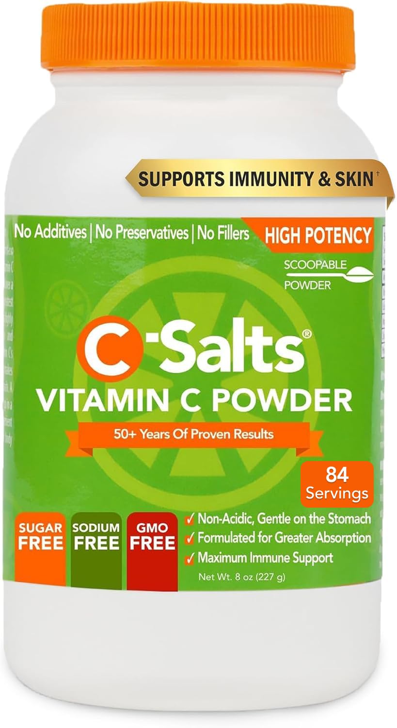 C-Salts Vitamin C powder with scoop beside water for easy daily use.