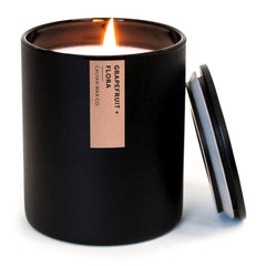 Calyan Wax Co. Grapefruit and Flora candle front view in matte black tumbler for elegant décor