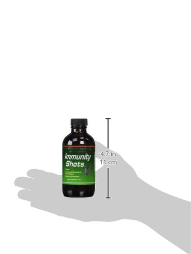 California Natural Immunity Shots on a kitchen counter with a juice for easy mixing