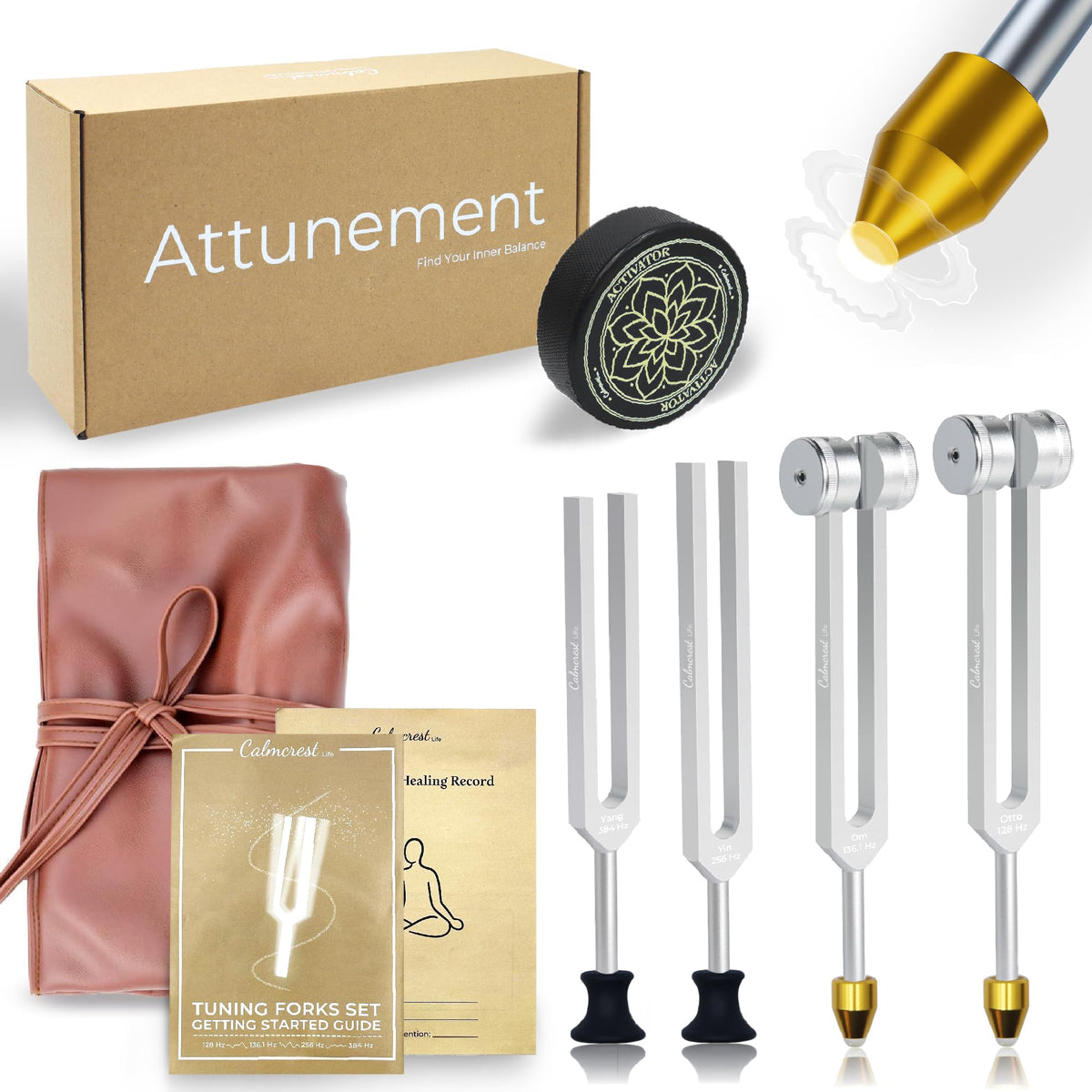 CALMCREST 128Hz tuning fork in hand for personal sound healing.