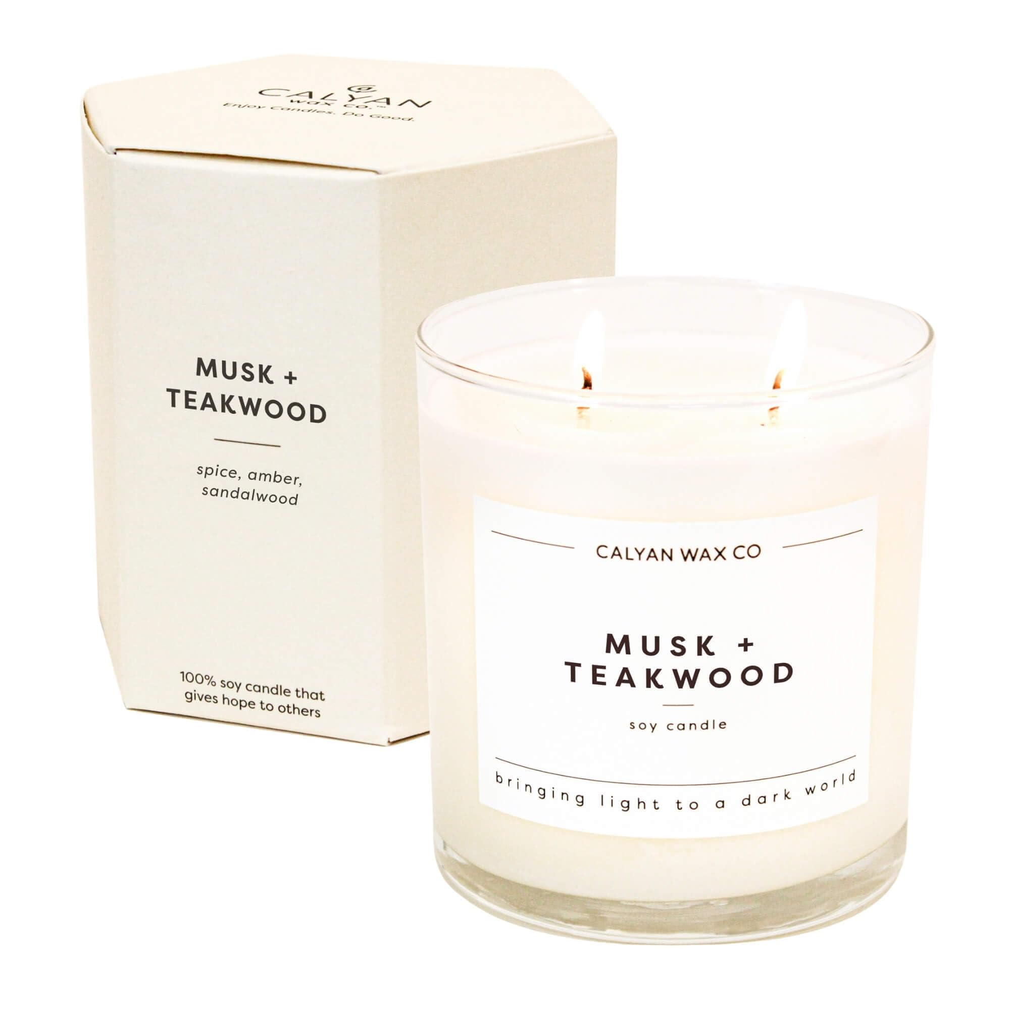 Calyan Wax Co. Musk & Teakwood front view candle in large glass jar for home ambience