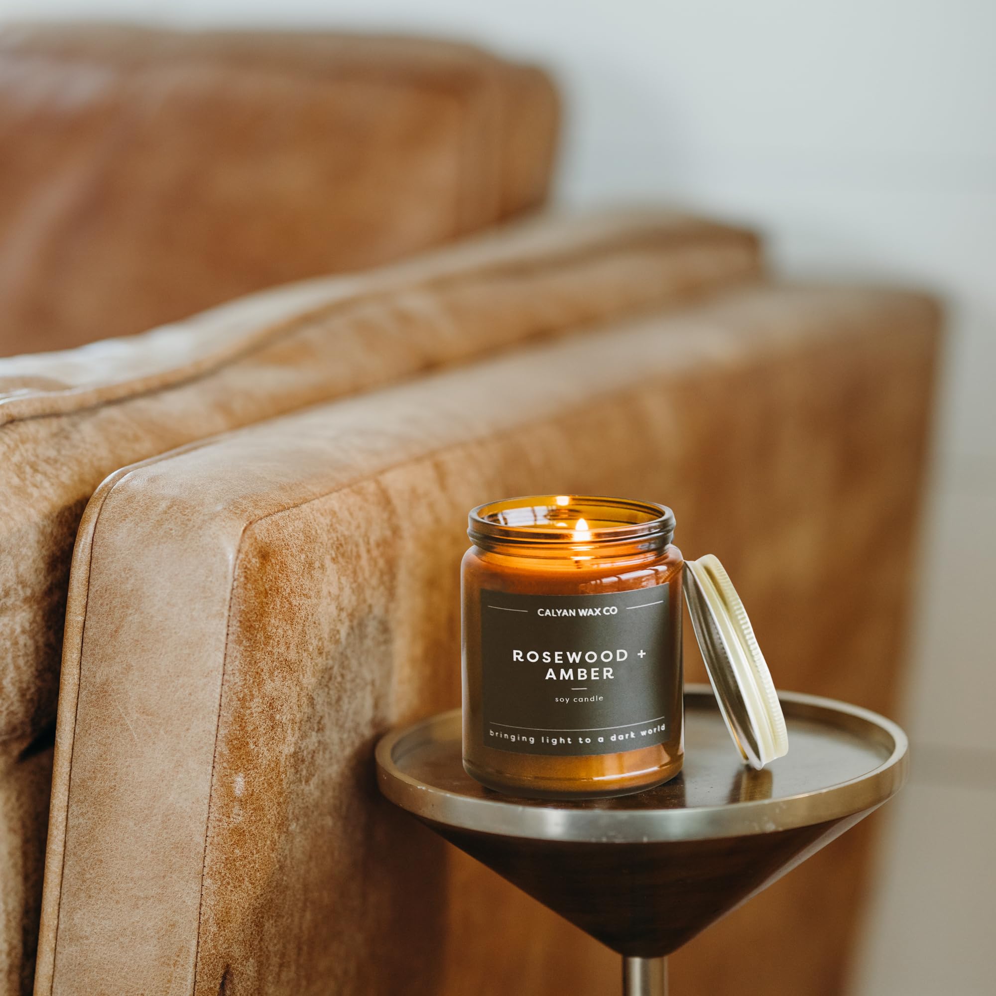 Calyan Soy wax candle details showing clean-burning material and wick.