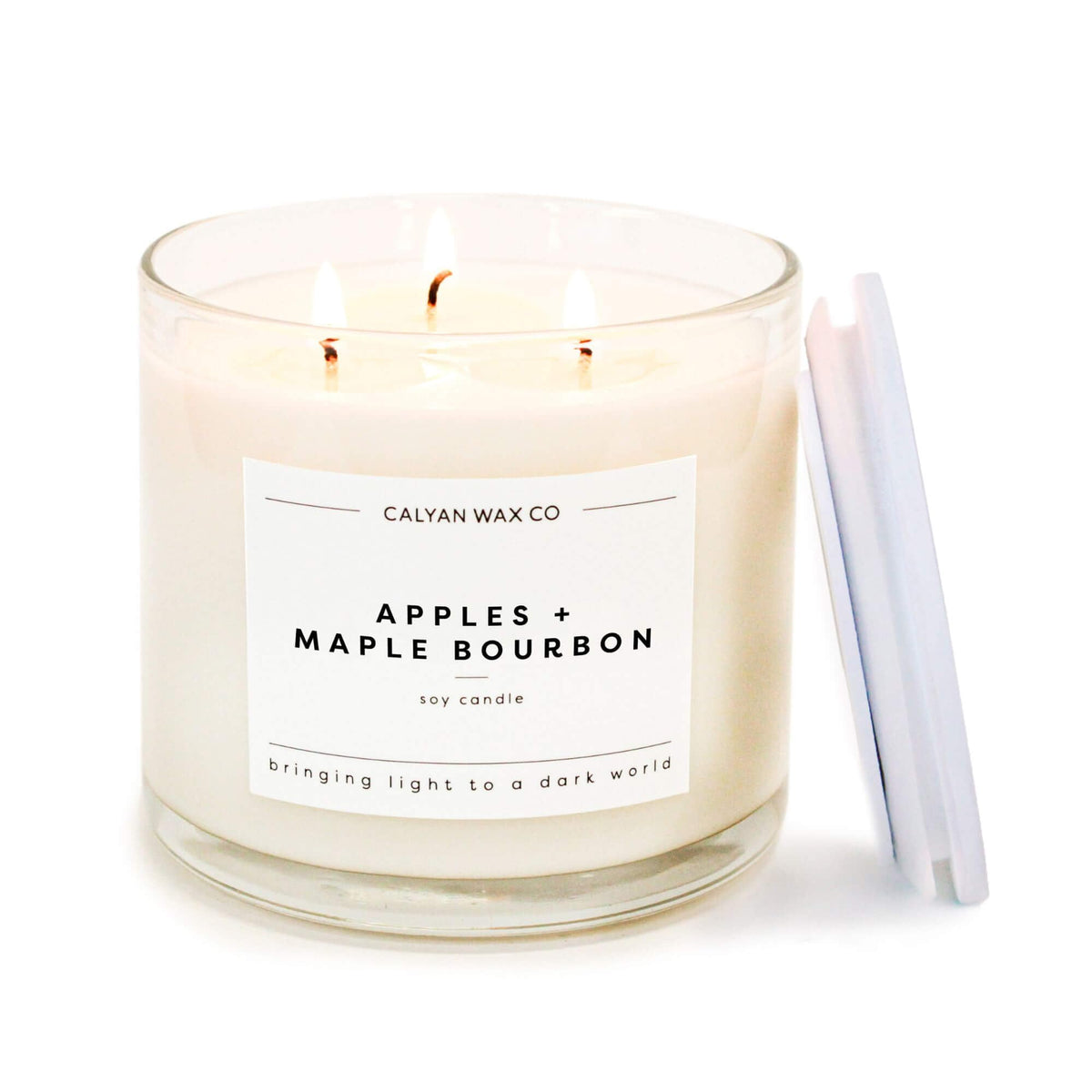 Calyan Wax Co. apples-maple-bourbon 3-wick candle emits inviting gourmand aroma