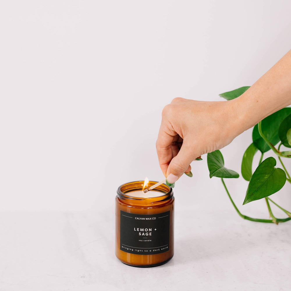 Calyan Wax Co. Apples & Maple Bourbon in a living room setting for inviting scents.