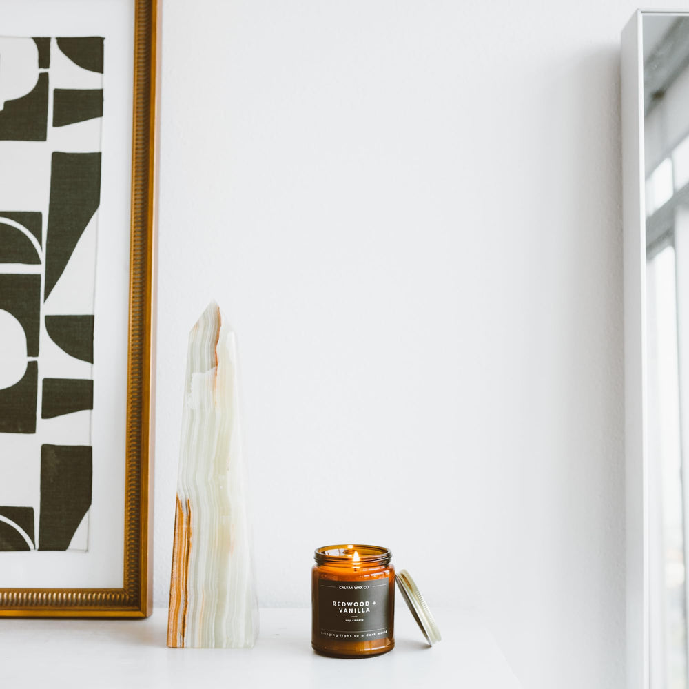 Essential oils blend in Calyan Wax Co Redwood & Vanilla candle.