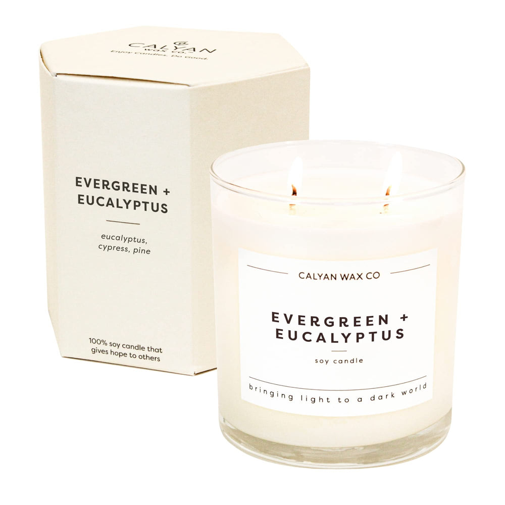 Calyan Wax Co. Evergreen & Eucalyptus candle in a glass jar for long-lasting ambiance.