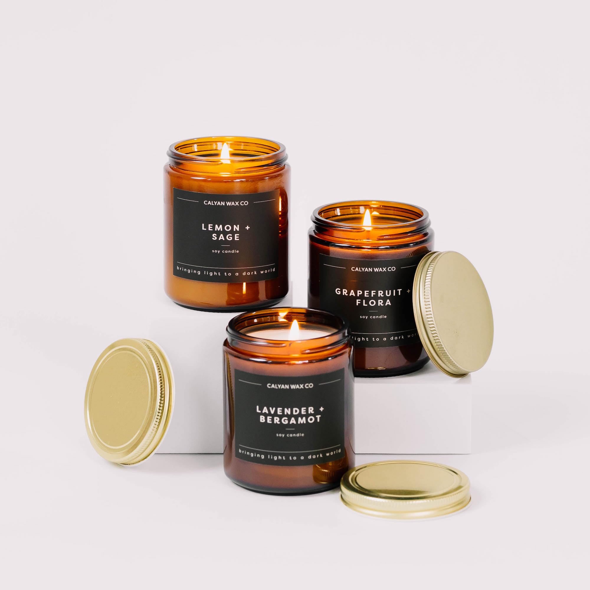 Calyan Wax Co Evergreen Eucalyptus candle in cozy living room setup