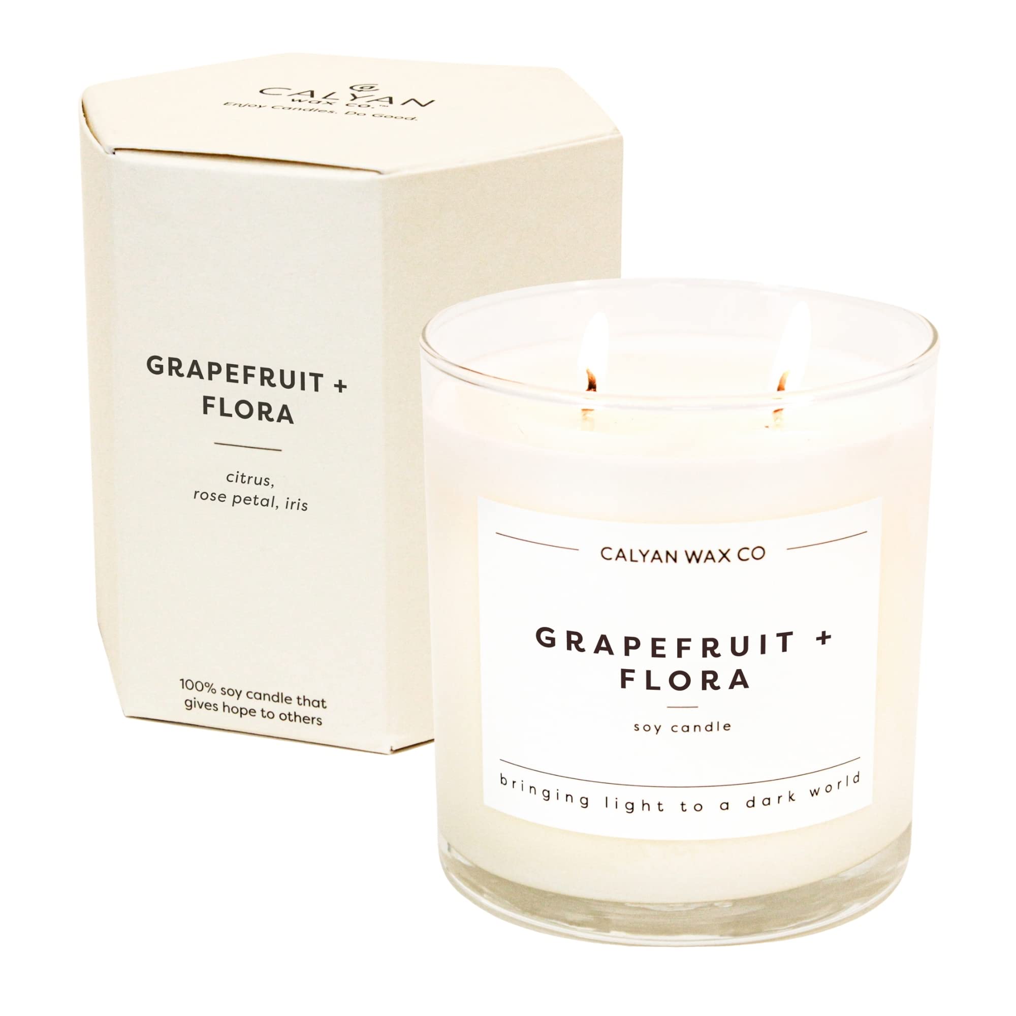 Calyan Wax Co Grapefruit Flora 2-wick bottle offers a vibrant room-filling aroma.