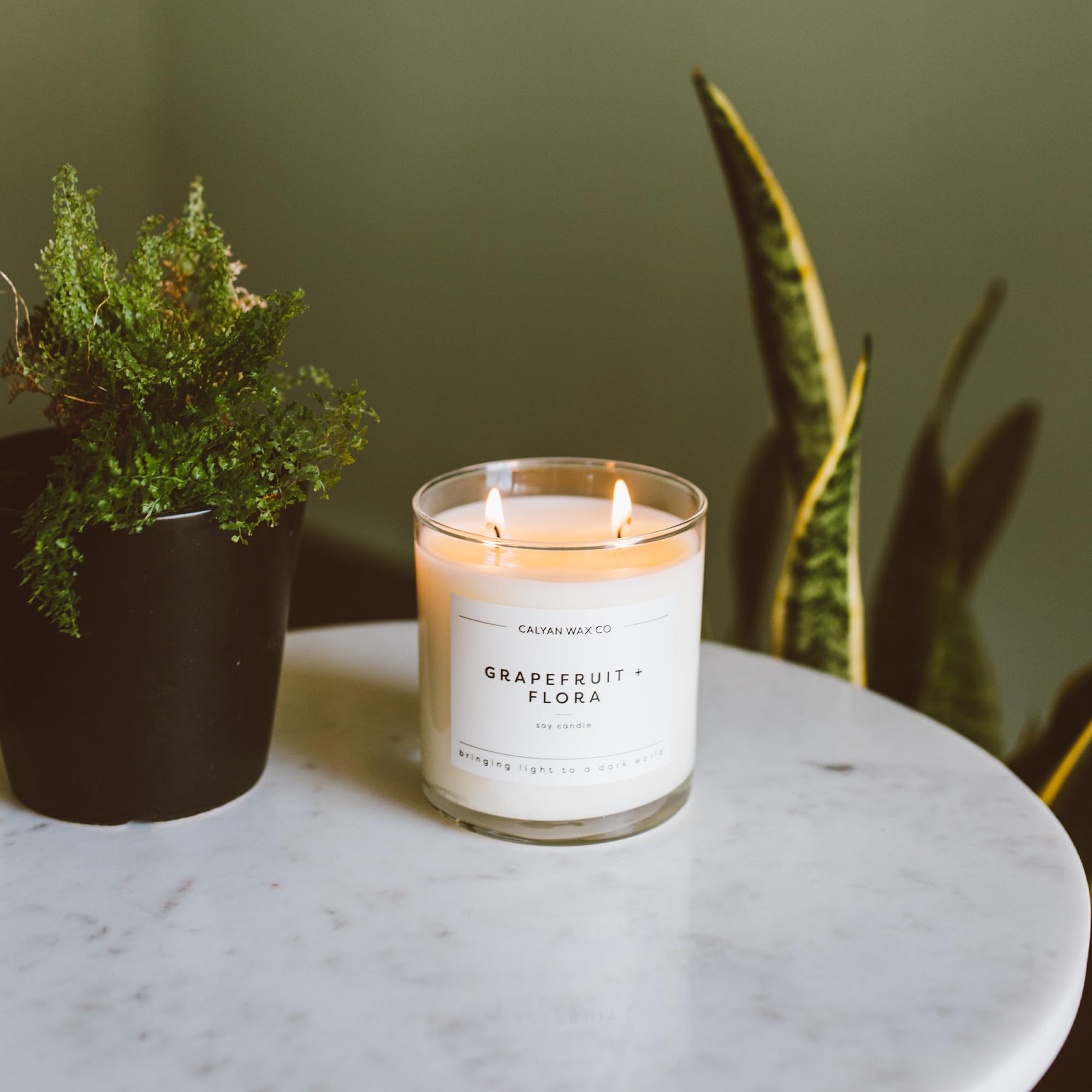 Calyan Wax Co Grapefruit Flora room scene with luxurious home scent.