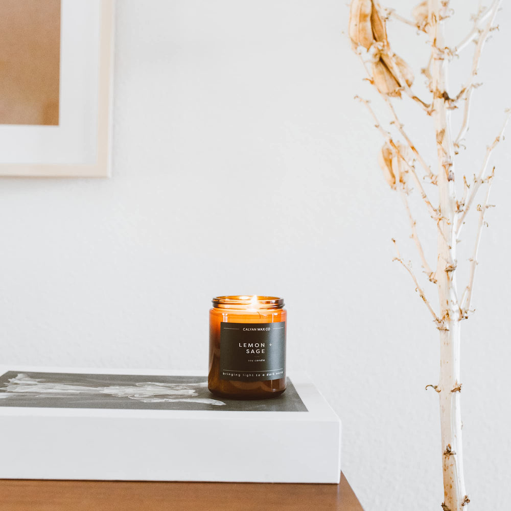 Calyan Wax Co living room scene showcasing luxurious non-toxic candle glow.