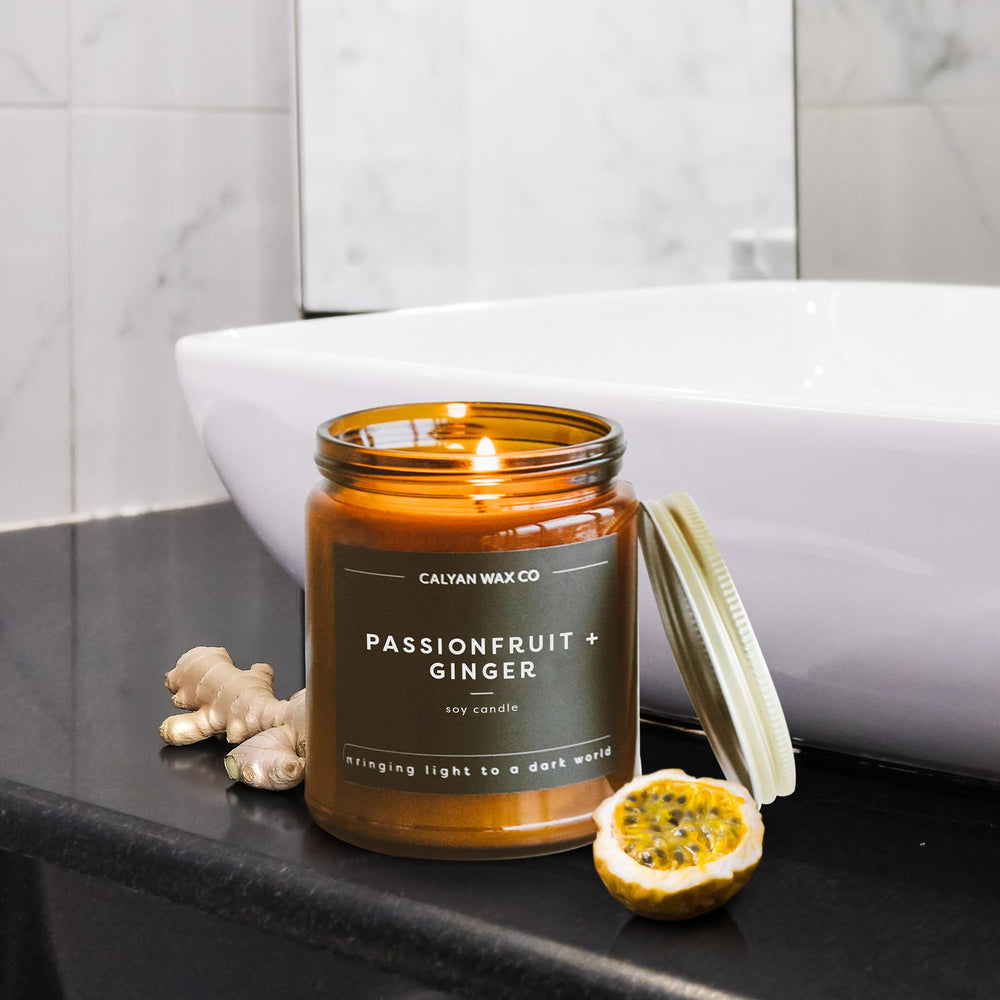 Calyan Wax Co. Passionfruit & Ginger candle in a room setting.