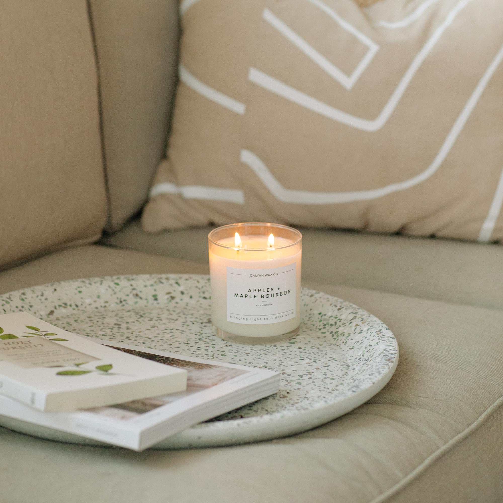 Room setting with Calyan Redwood and Vanilla filling a spacious area