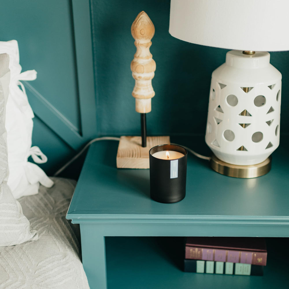 Calyan Wax Co. teakwood and cedar notes create a warm ambience