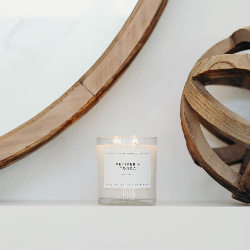 Calyan Wax Co Vetiver Tonka creates cozy room ambience.