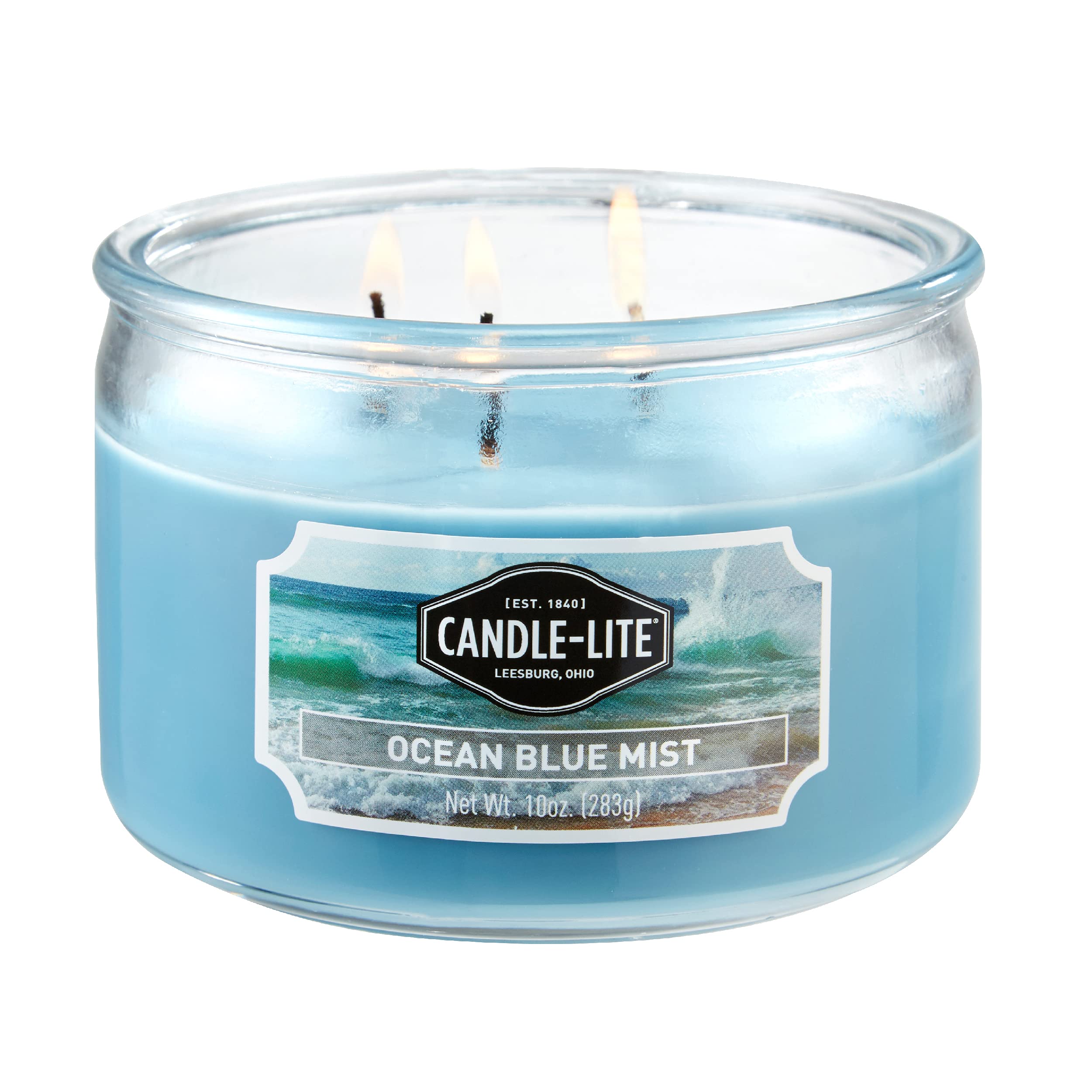 Candle-Lite Ocean Blue Mist jar close-up showing calming blue wax for serene spaces.