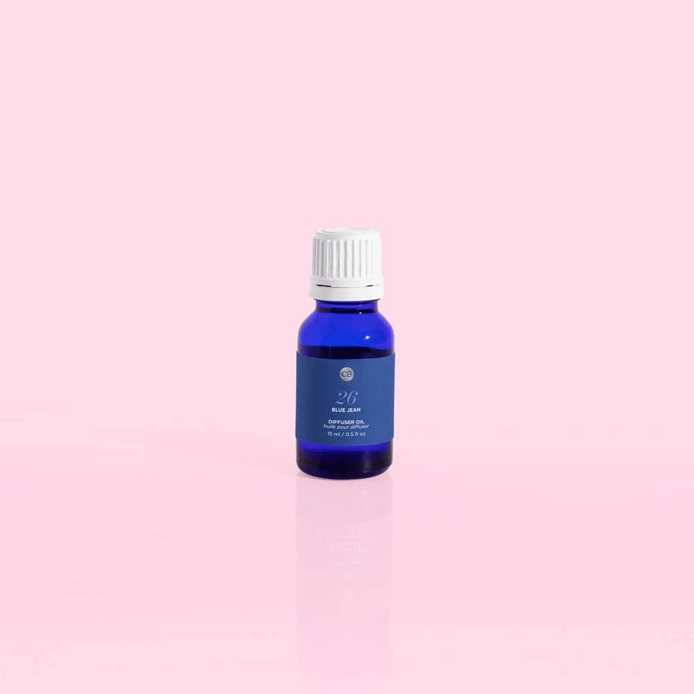 Capri Blue Blue Jean bottle with aroma droplets for diffuser use.