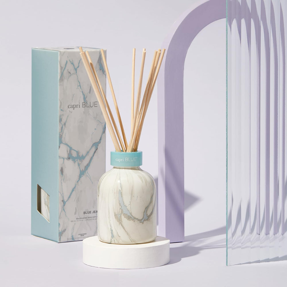 Capri Blue Blue Jean diffuser reeds spread fragrance through stylish sticks.