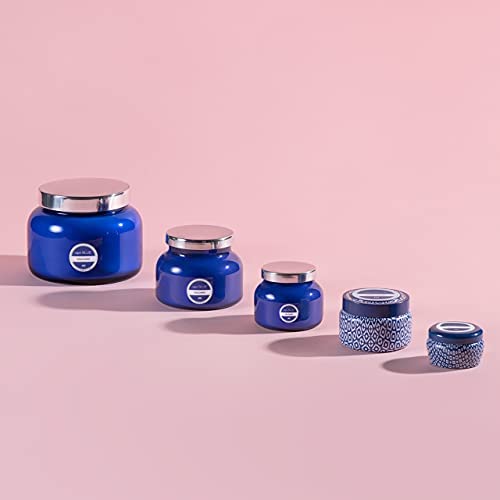 Capri Blue Blue Jean travel tin wick close-up, clean burn.