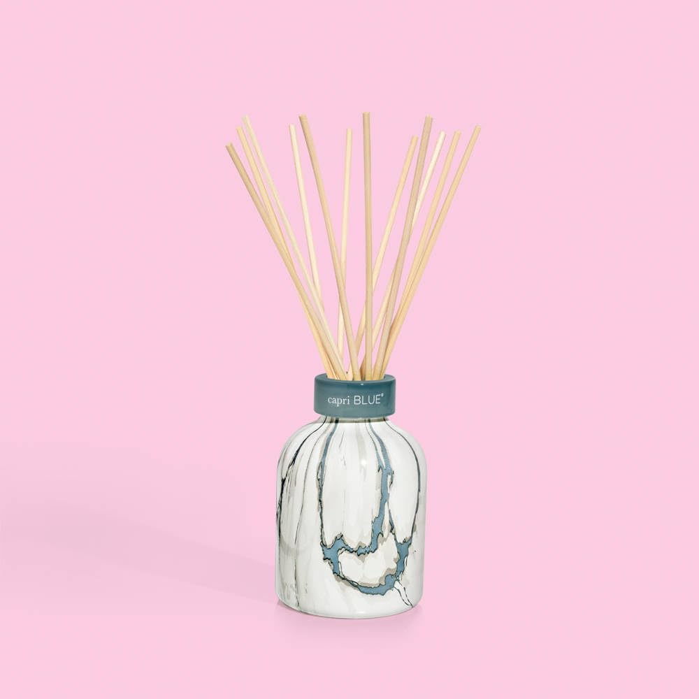 Capri Blue Modern Marble diffuser in a stylish bedroom setup.