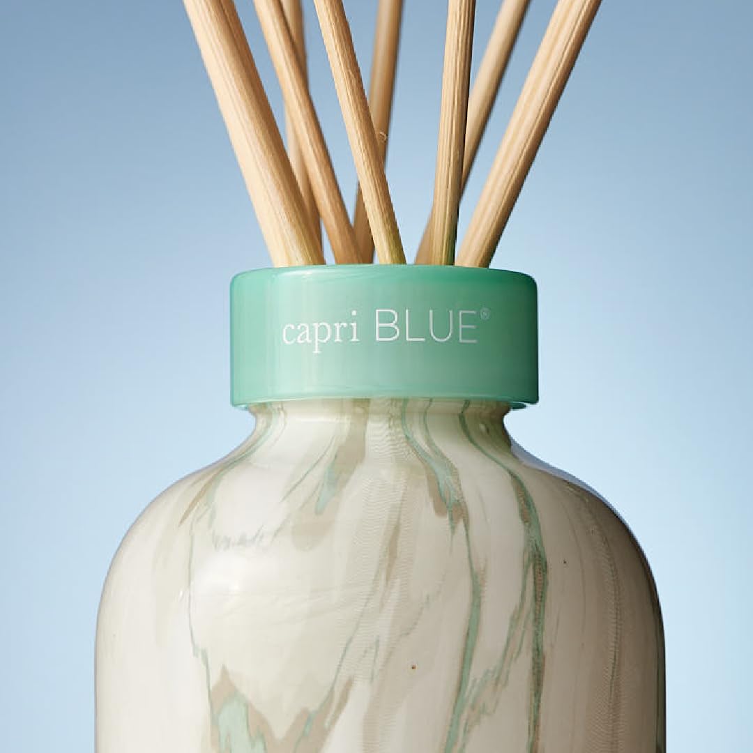 Capri Blue marble diffuser sits on sea glass base for stylish appeal.