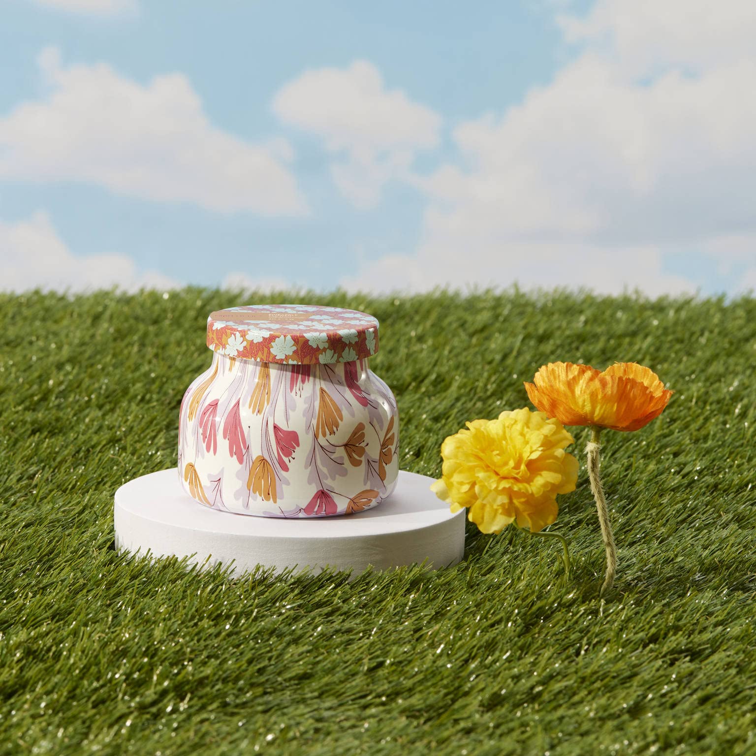 Capri Blue Pattern Play glass jar design adds a fruity floral touch to any room.