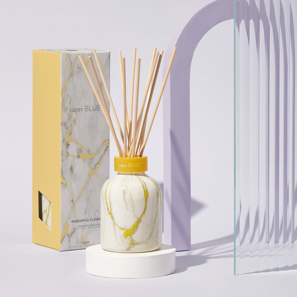 Capri Blue Pineapple Flower scented oil for island-inspired ambiance.