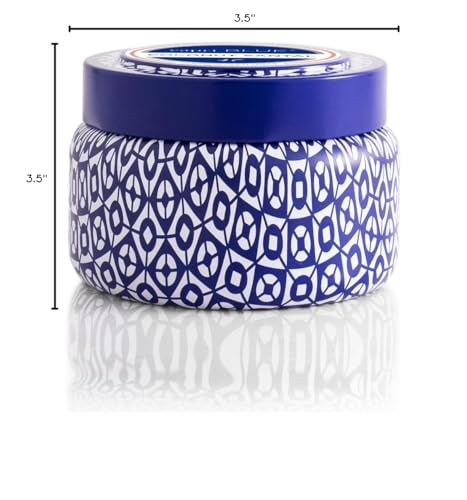 Capri Blue travel tin shown with lid on for travel-ready fragrance.
