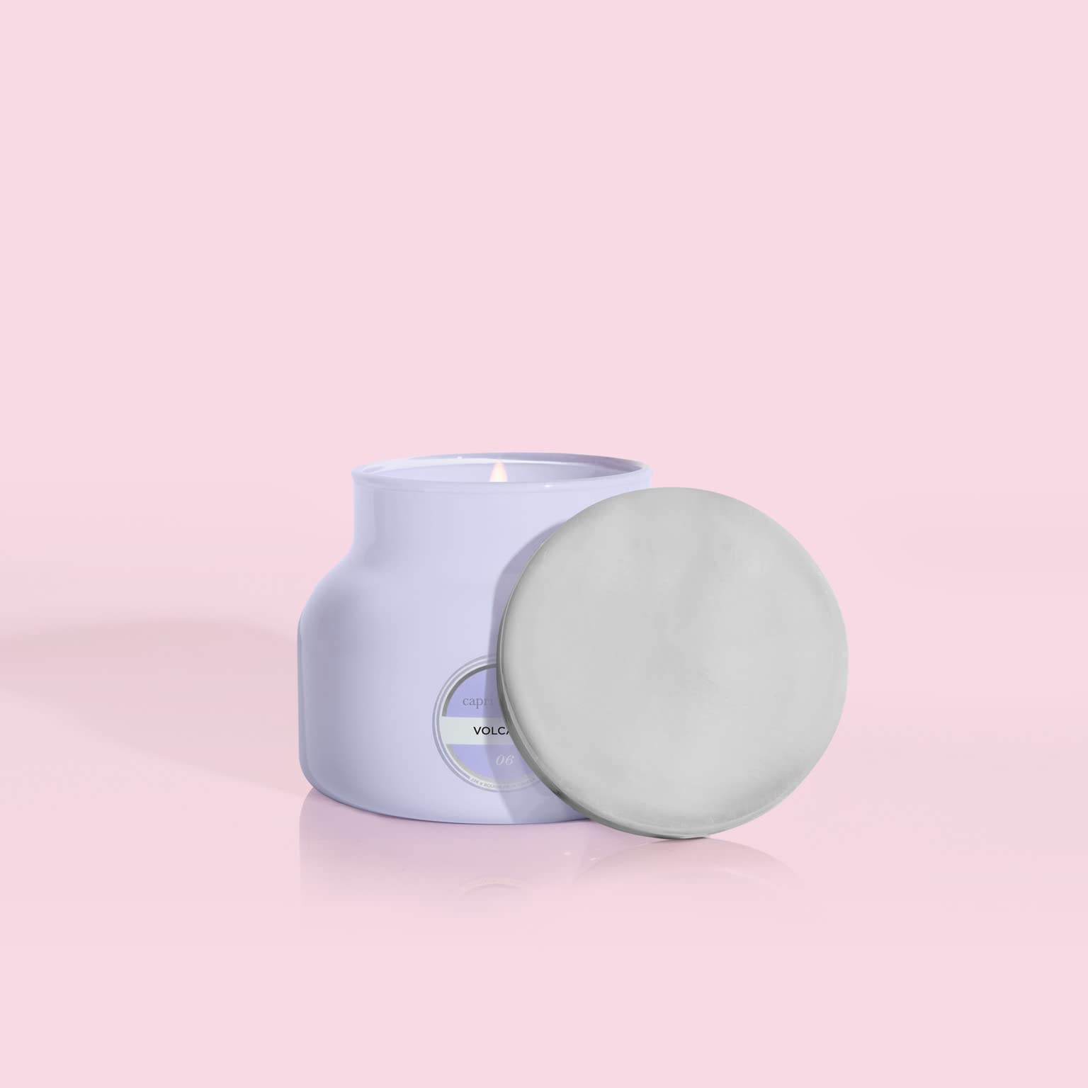 Capri Blue Volcano Lavender Petite Jar in ambient scene enhancing a tropical mood