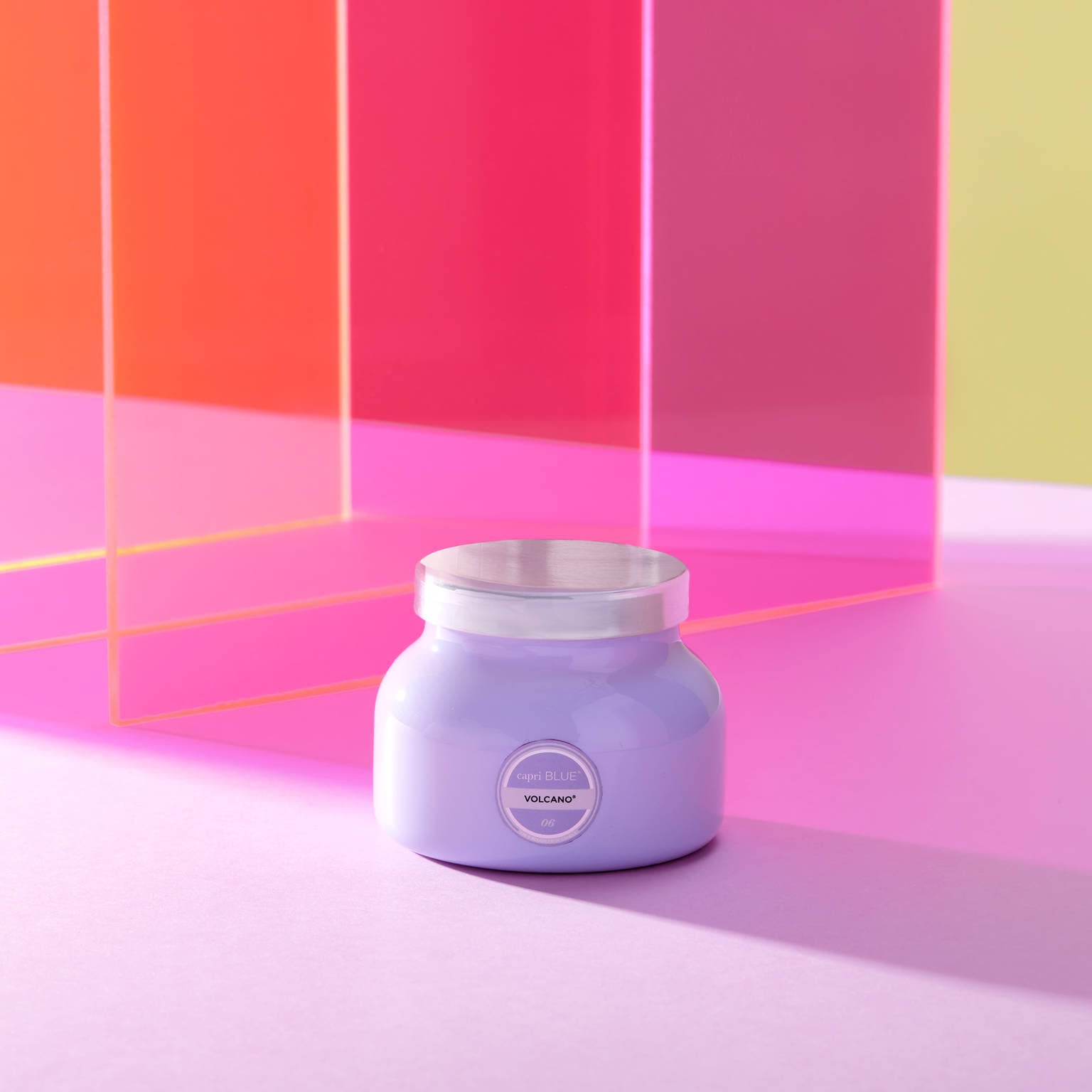 Capri Blue Volcano Lavender Petite Jar candle lit to fill a cozy space with island citrus notes