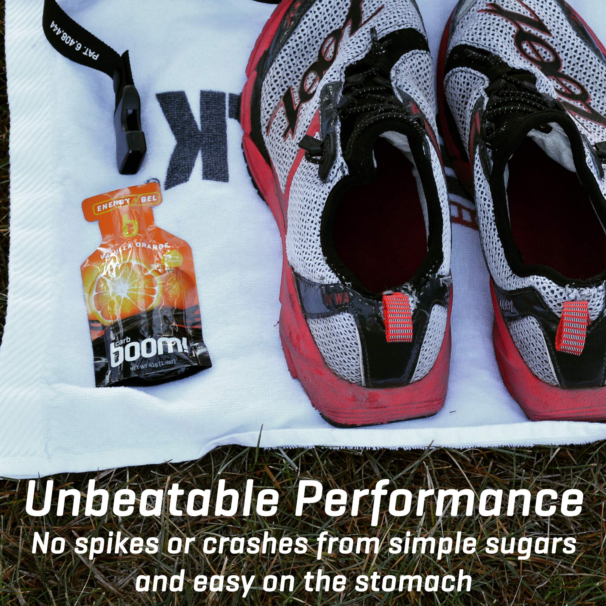 Cyclist applying Carb Boom Energy Gel Apple Cinnamon during a ride.
