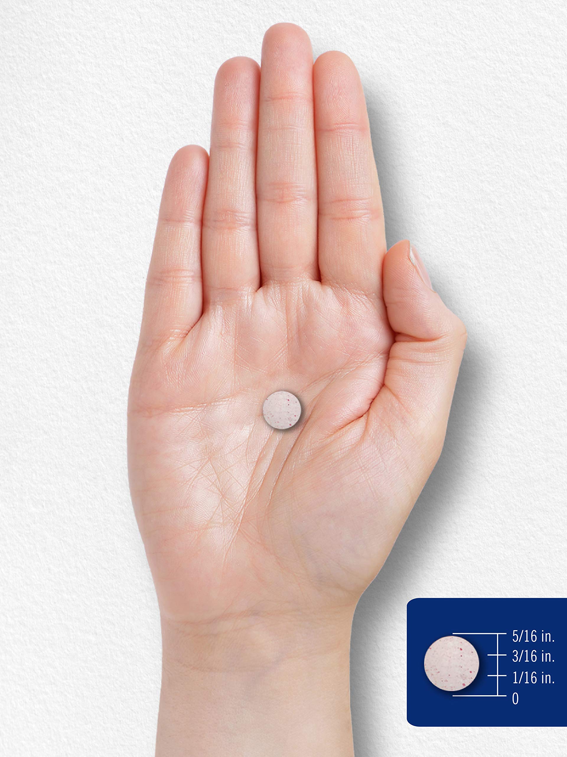 Carlyle Biotin tablet close-up highlighting easy-to-swallow form.