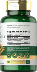 Carlyle KSM-66 Ashwagandha capsules pouring from bottle.