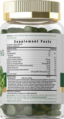 Close-up of wheat grass, spirulina, and spinach in Carlyle Supergreens ingredients.