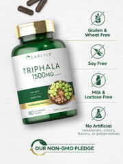 Carlyle Triphala glass bottle on bright surface emphasizes premium wellness packaging.
