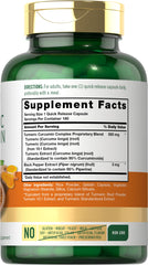 Carlyle Turmeric Curcumin capsules close-up highlighting easy-to-swallow servings.