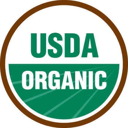 Carmel Organics Ashwagandha powder packaging on a pantry shelf.