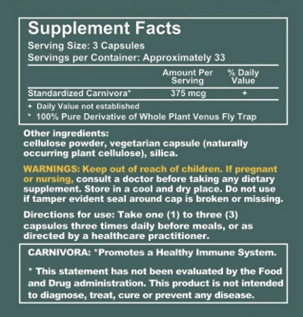Carnivora Vegi-Caps capsules poured for easy daily dosing.
