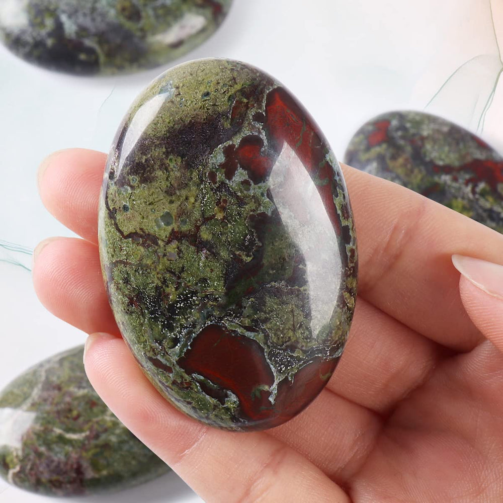 CASMON Dragon Bloodstone pocket stone used for grid meditation and ritual use.