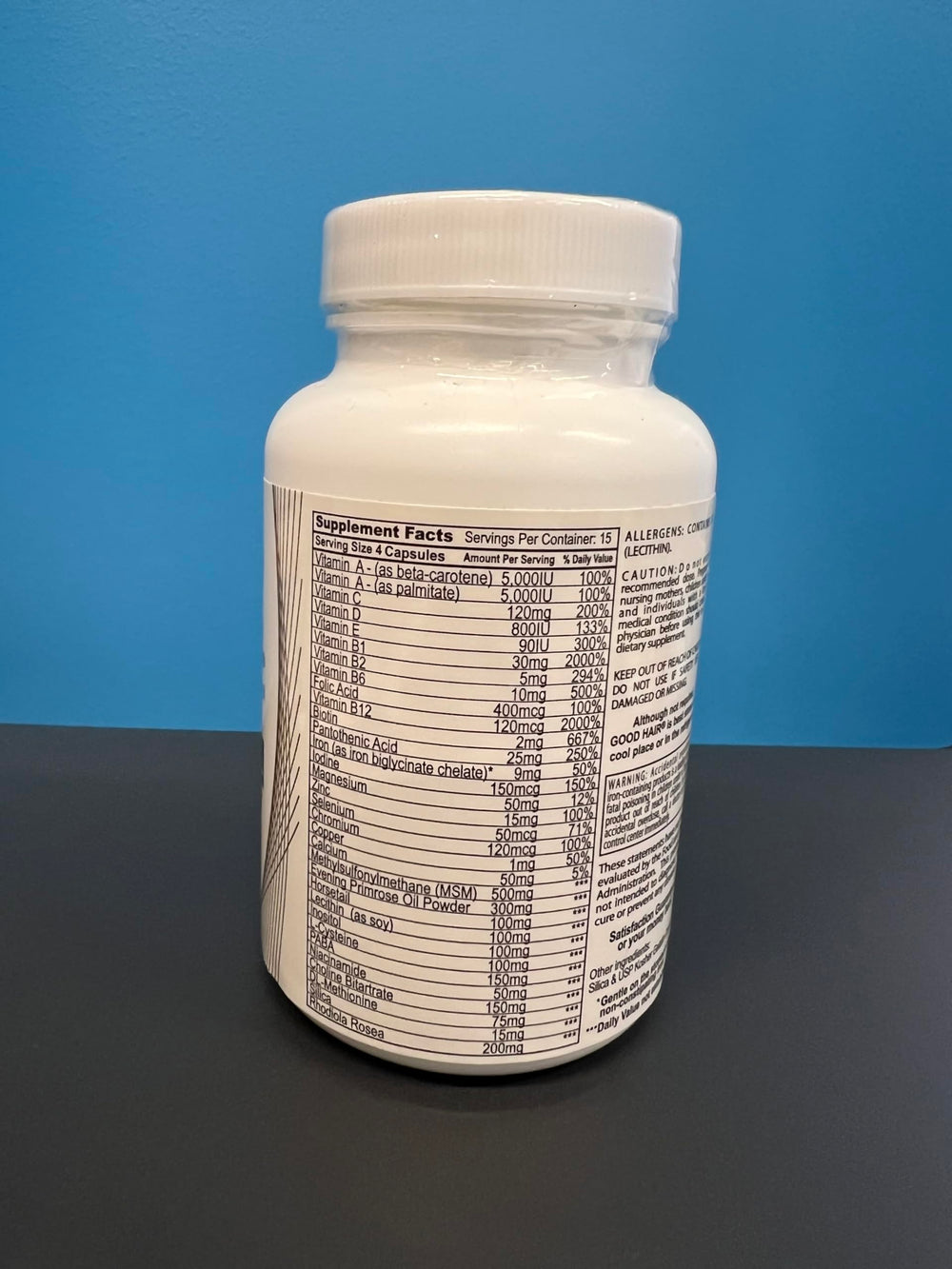 Century Systems Good Hair label closeup highlights packaging and key ingredients.