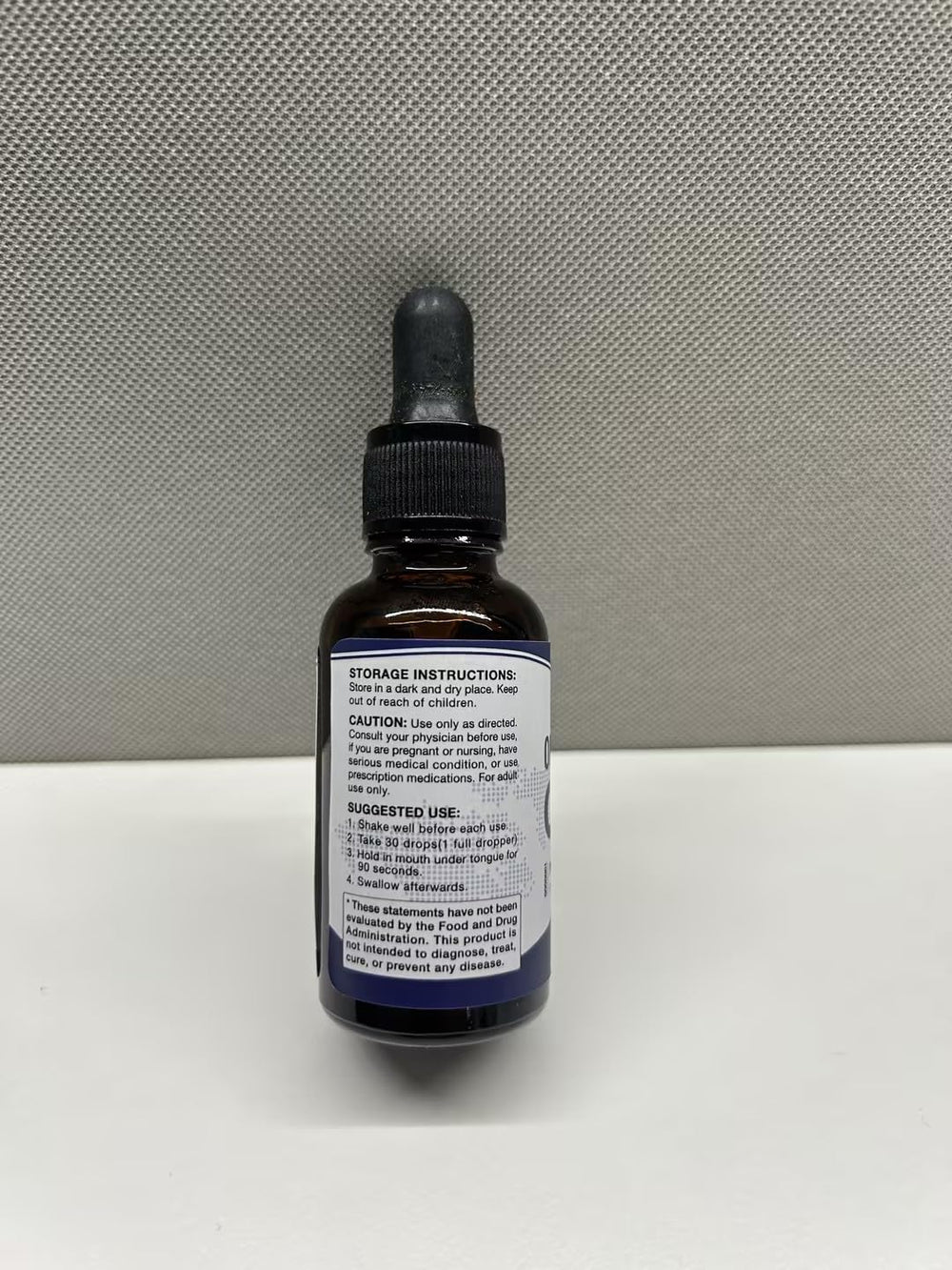 CHANUBITO Omega Oil Drops pour showing easy-dose cap for precise serving.