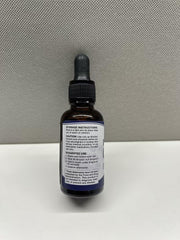 CHANUBITO Omega Oil Drops pour showing easy-dose cap for precise serving.
